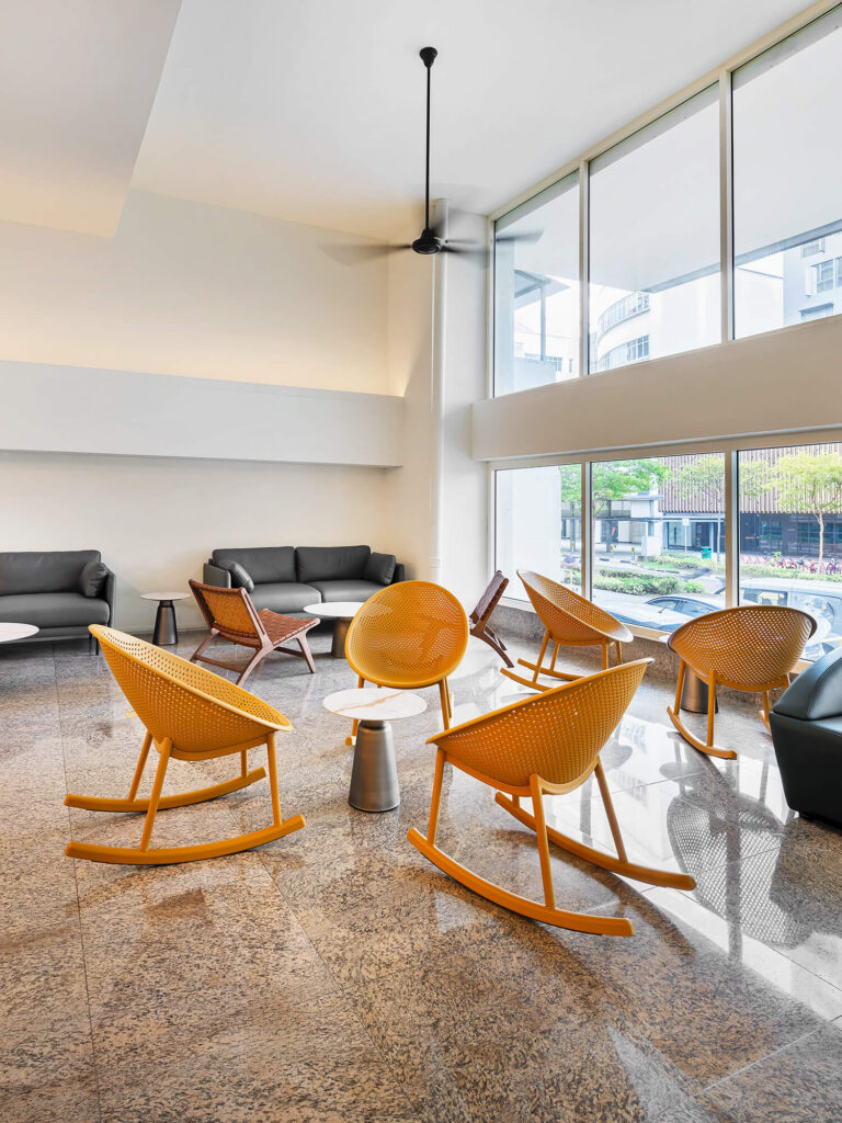 Strand Hotel Singapore lobby: inviting reception area with comfortable seating. One of facilities in Strand Hotel.